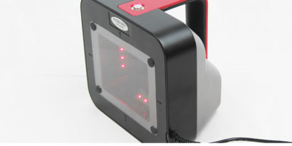 Axicon 15000 series barcode verifier facing left scanning screen showing